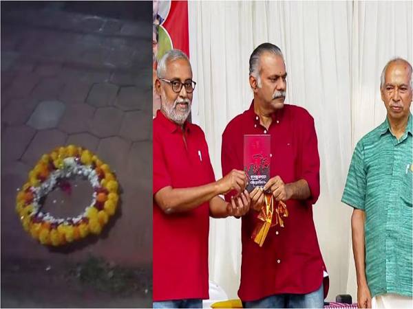 വി കുഞ്ഞികൃഷ്ണന്റെ പുസ്തകം ഏറ്റുവാങ്ങിയ വി എസ് അനിൽകുമാറിന്റെ വീടിന് മുന്നിൽ റീത്ത്